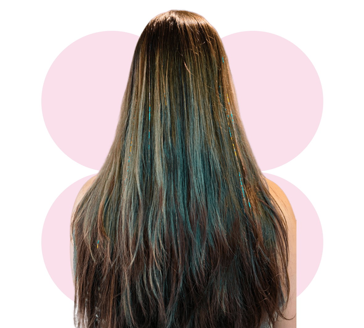 Long, multicolored hair on black background.