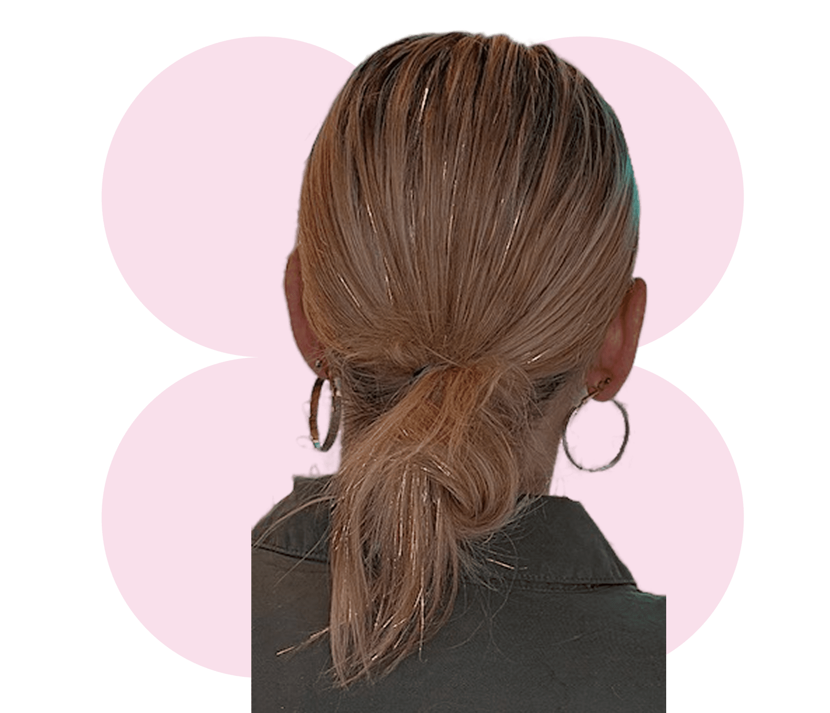 Back view of person with tied hair.